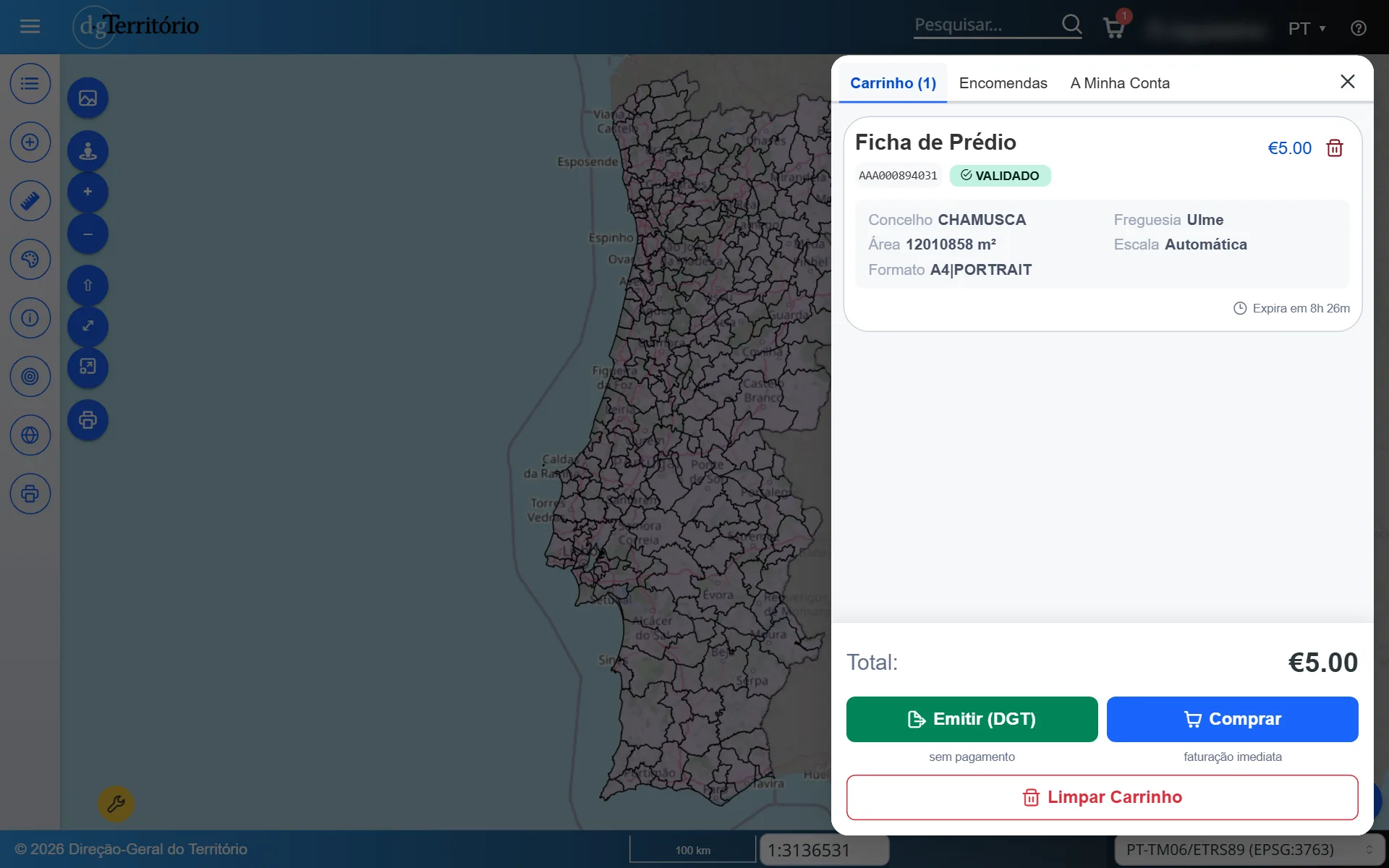 O carrinho no computador, com uma ficha de prédio validada, o total e os botões Emitir e Comprar.